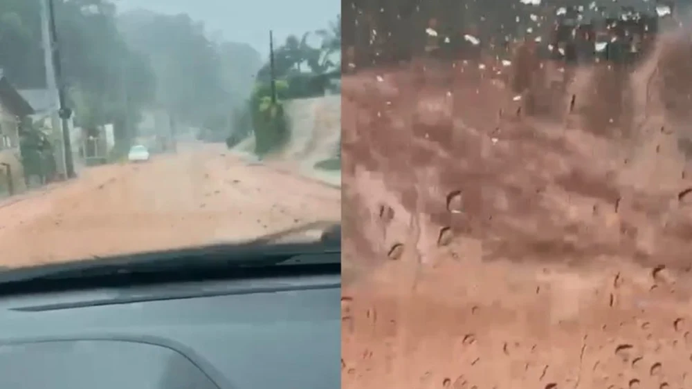 Enxurrada em SC: Rua se transforma em corredeira de lama